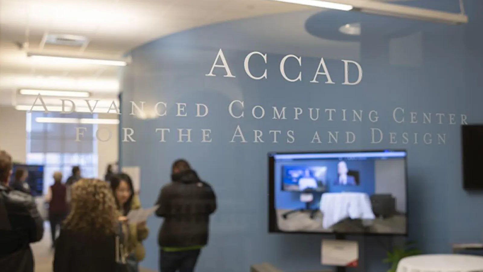 Interior view of the ACCAD facility showing people gathered