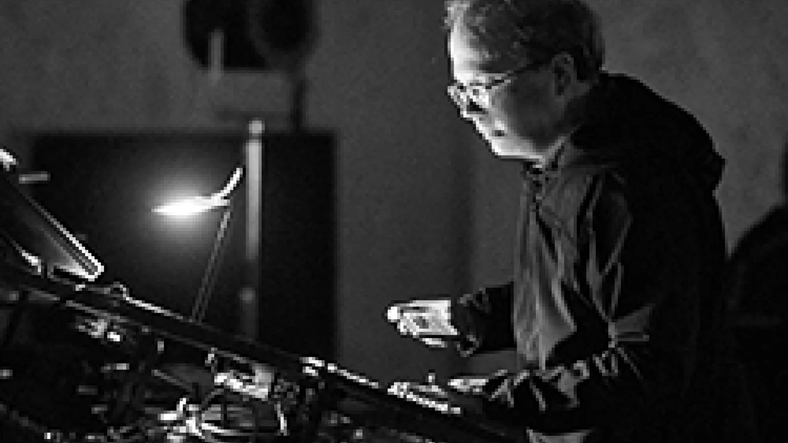 picture of Marc Ainger preparing for concert