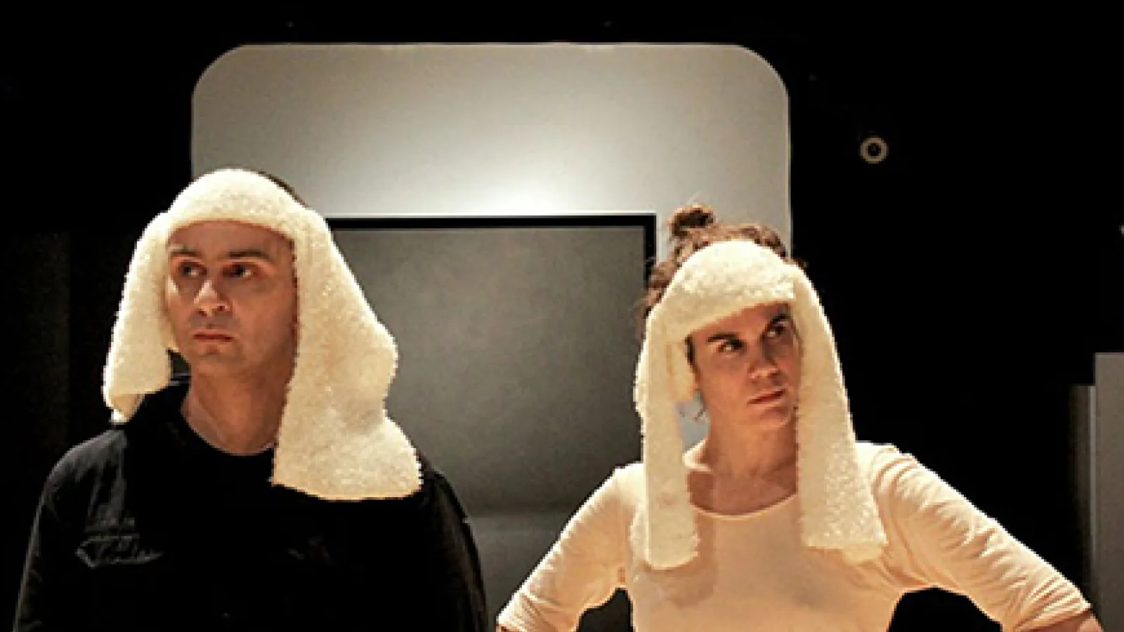 two persons with cloth on heads