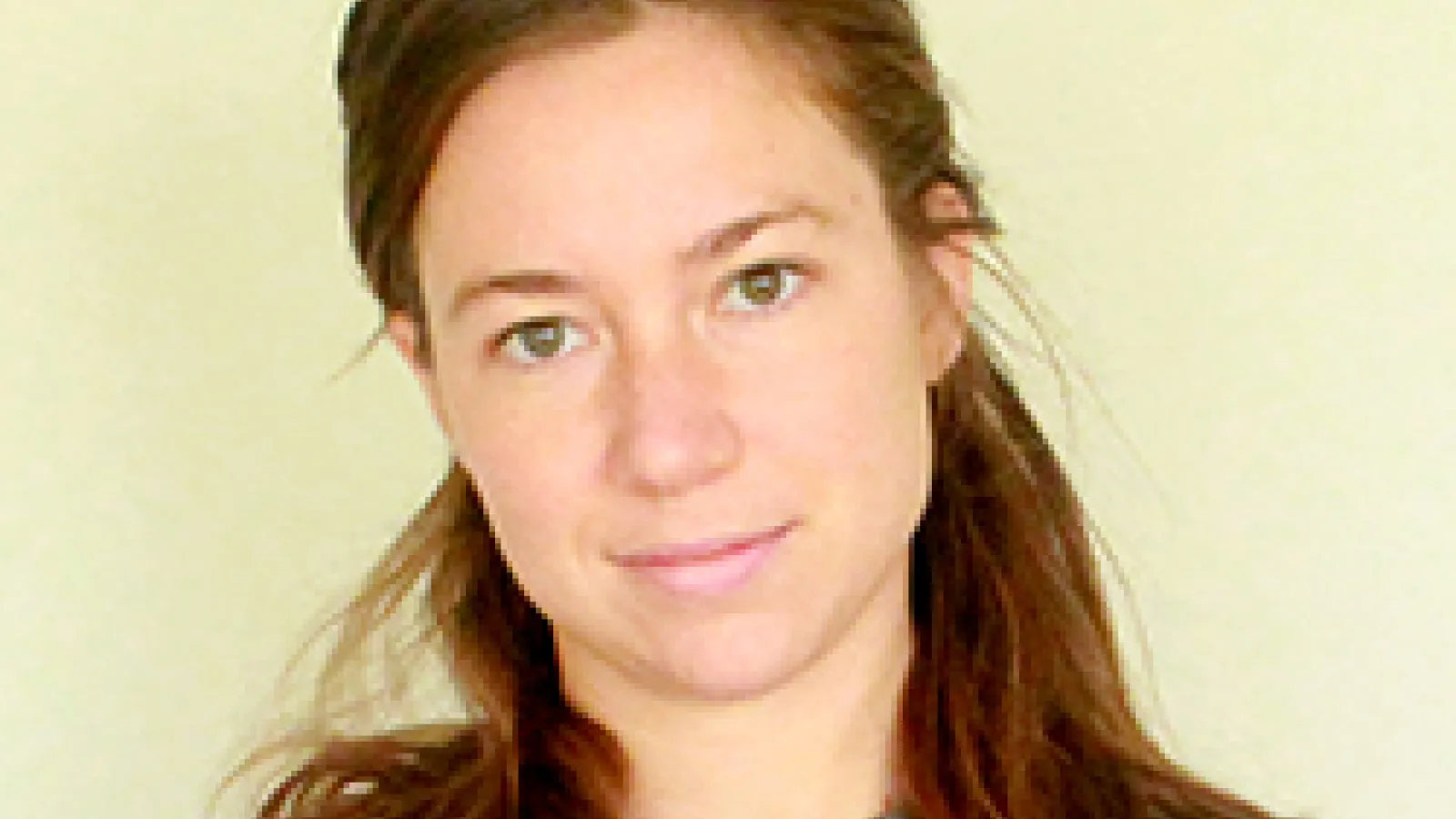 Woman grinning at camera
