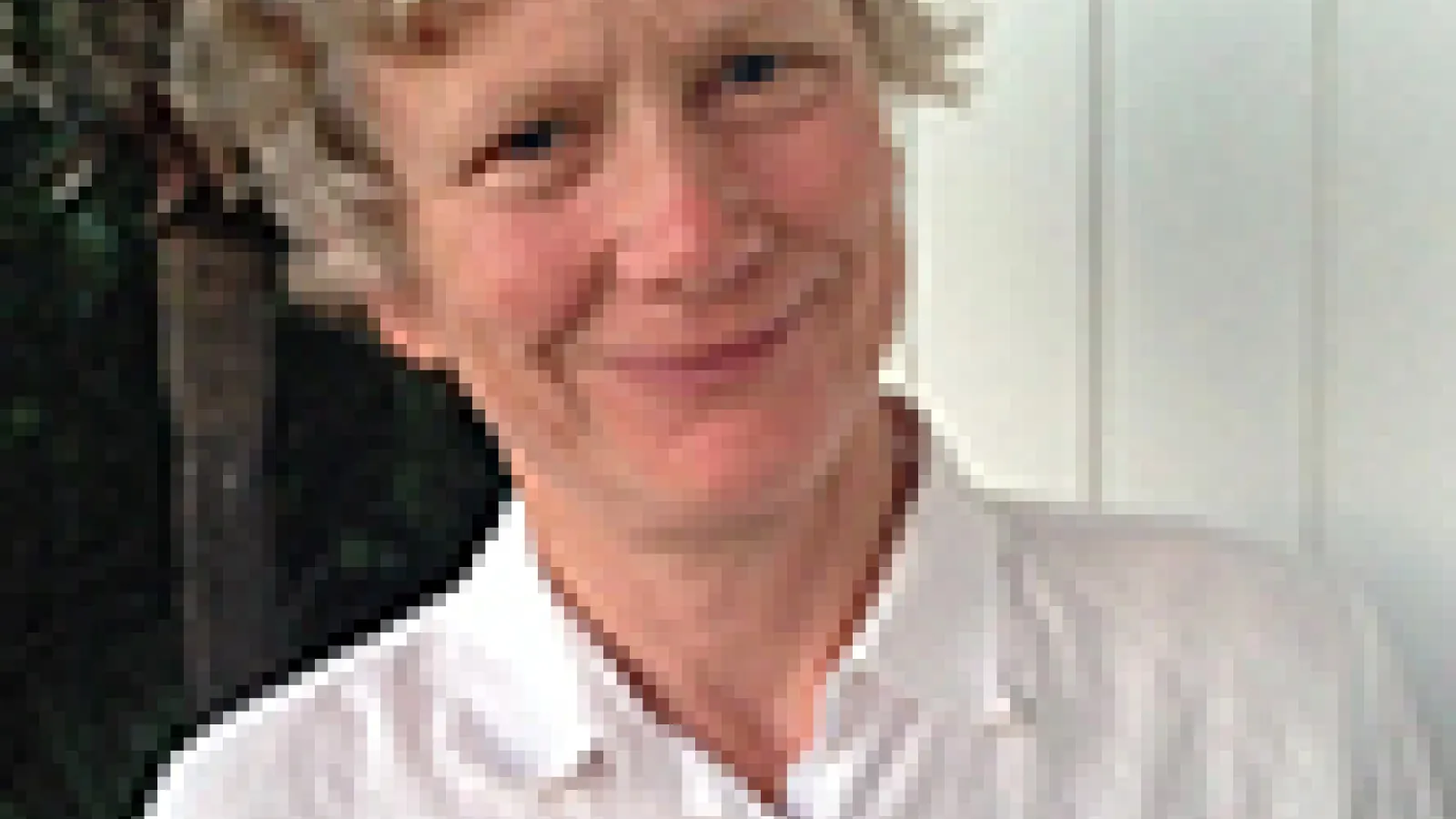 woman grinning towards camera