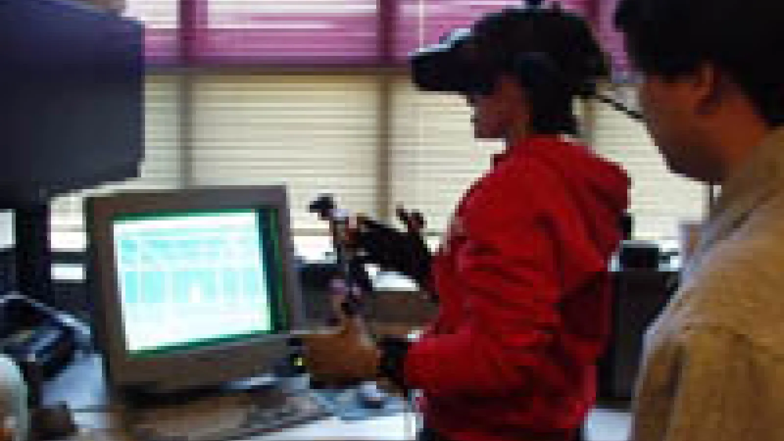 Series of virtual works and student using VR interface