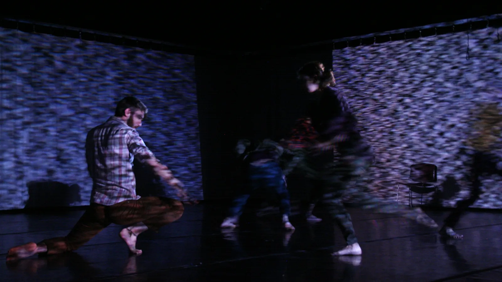 Actors on a projected stage