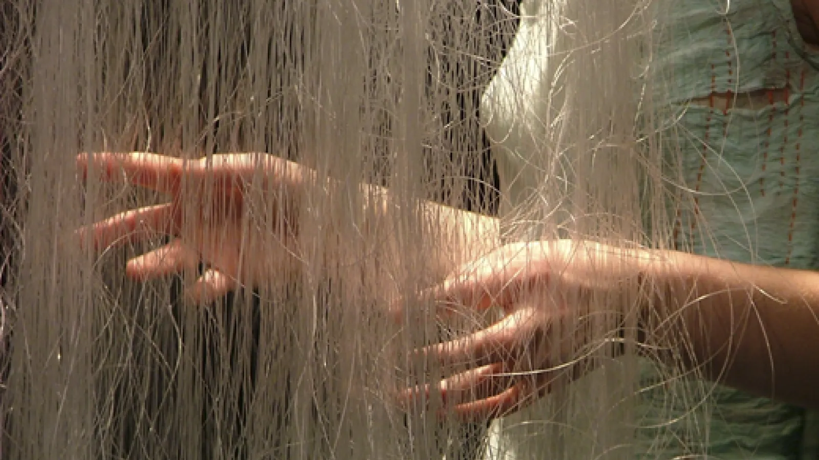 Hands in string