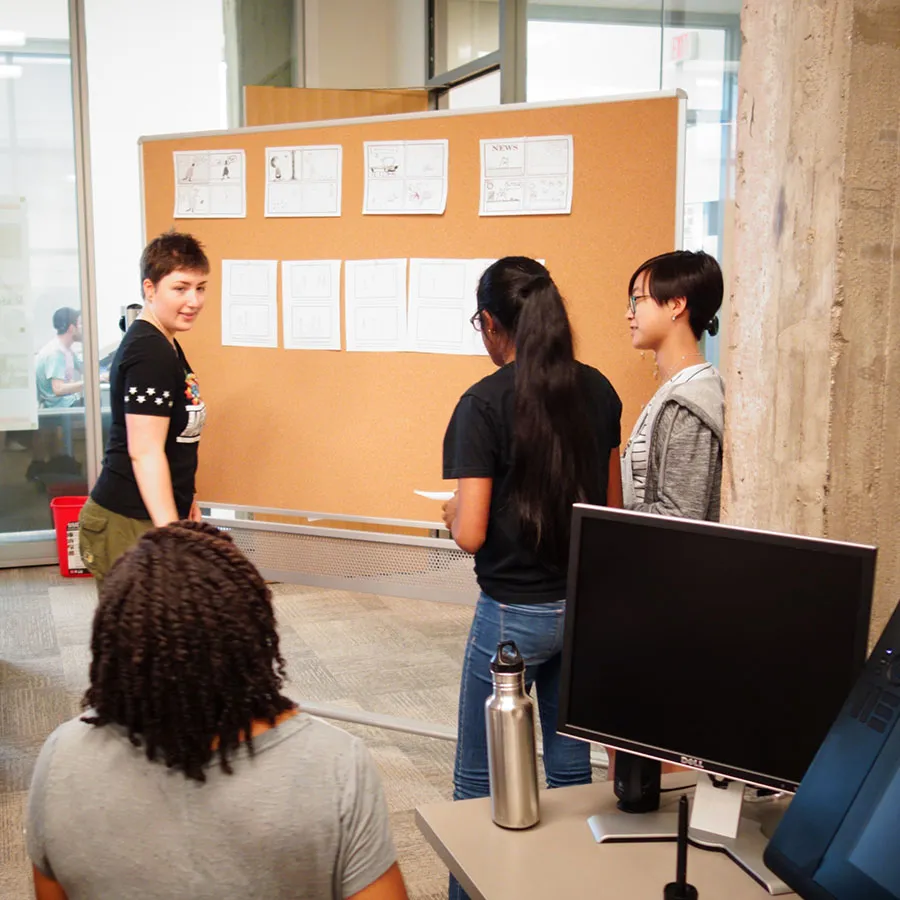 students working together on storyboards
