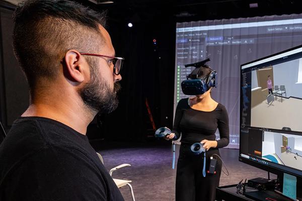 John Luna, an interactive digital media developer at Nationwide Children’s Hospital, testing a VR project in the Motion Lab