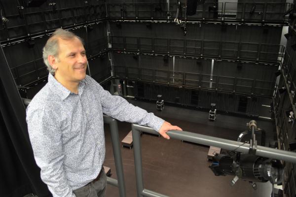 Eric Lyon surrounded by speakers