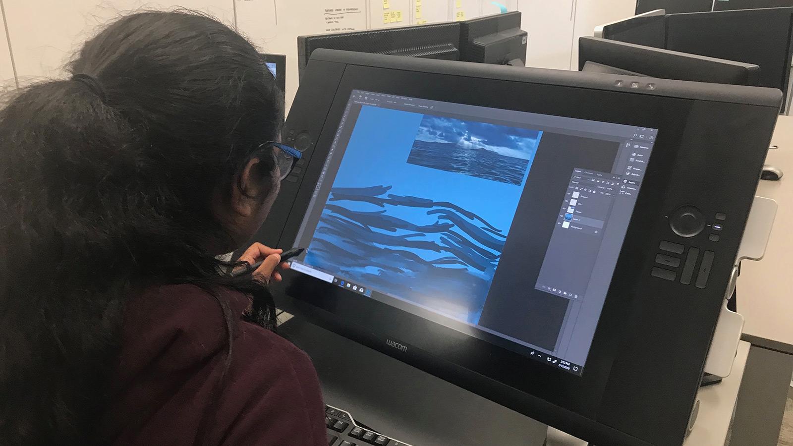 student working on a digital animation