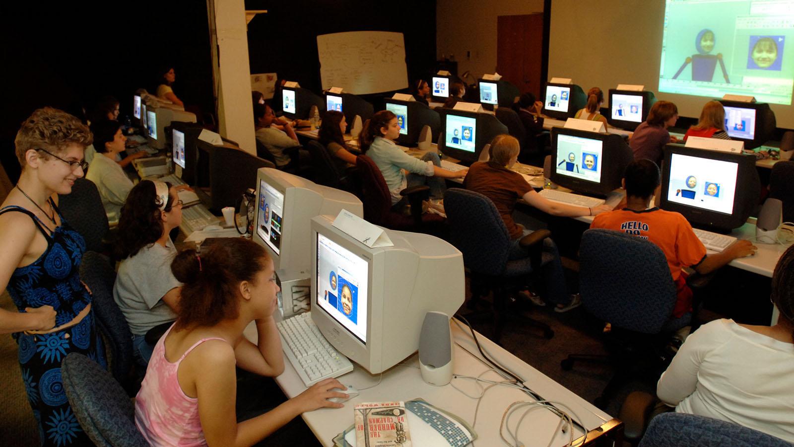 students and mentors working in computer lab