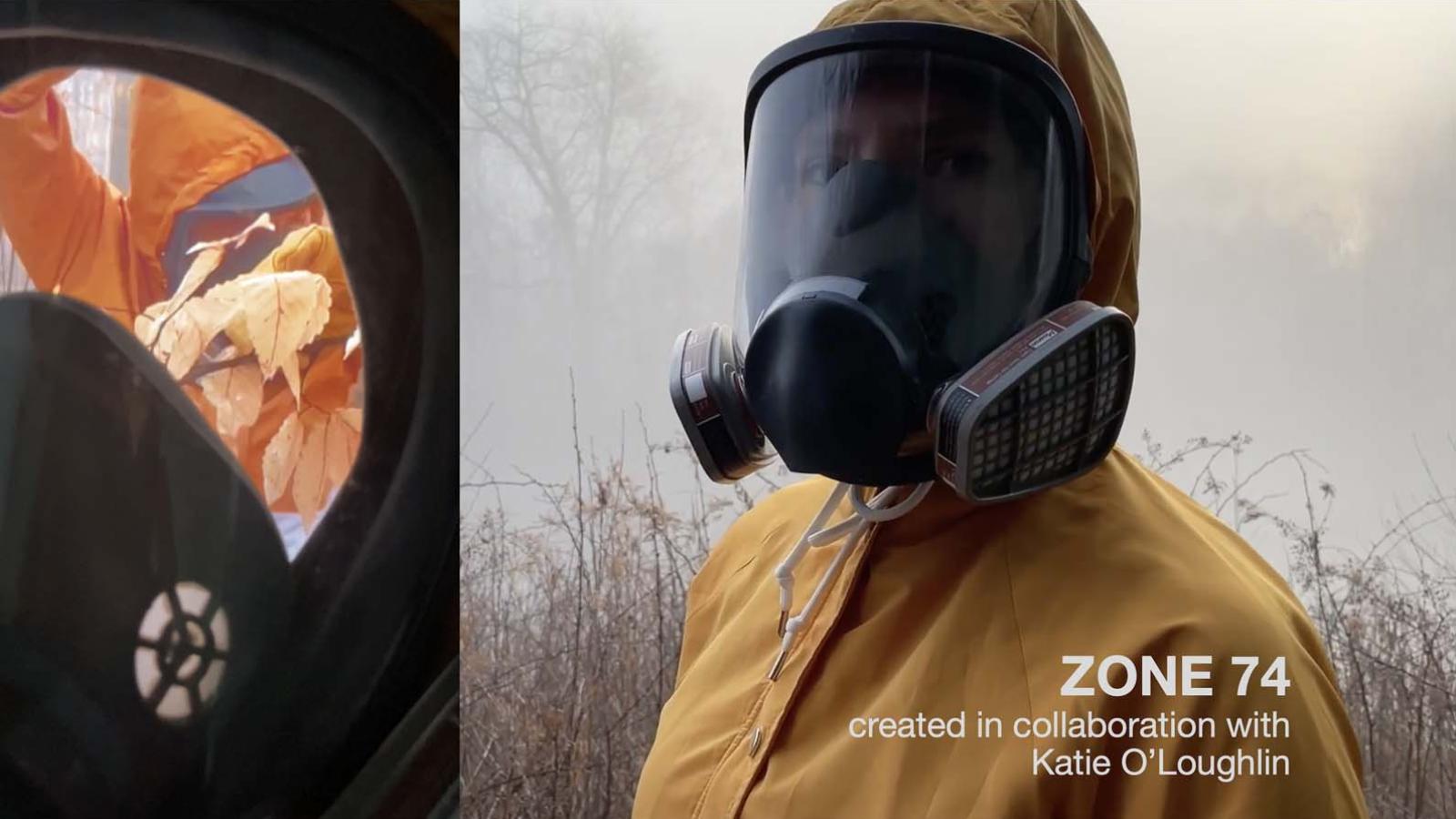 A woman in a hazmat suit looks into the camera in a barren landscape surrounded by fog 