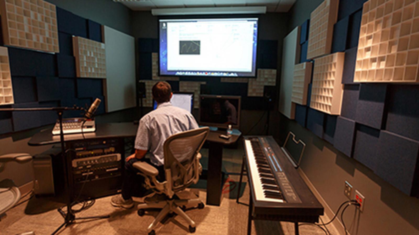 A student conducts a project in the Sonic Arts Lab